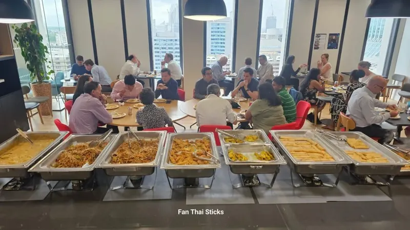 Office lunch with Thai dishes in chafing dishes