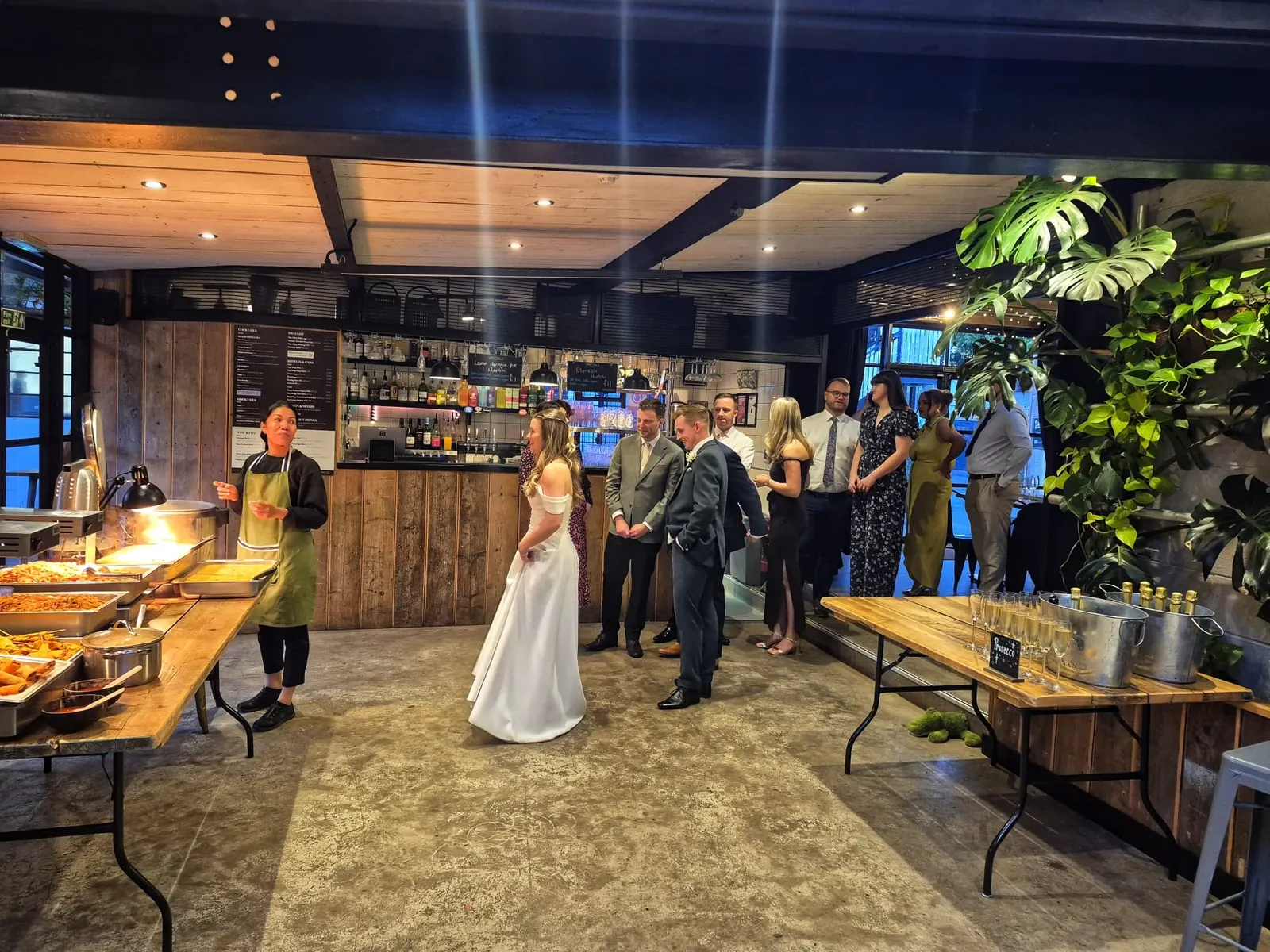 Bride and groom at their reception with our Thai buffet
